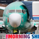 A worker looks up underneath a Boeing 737 MAX jet Monday, Dec. 16, 2019, in Renton, Wash. Shares of Boeing fell before the opening bell on a report that the company may cut production of its troubled 737 MAX or even end production all together.